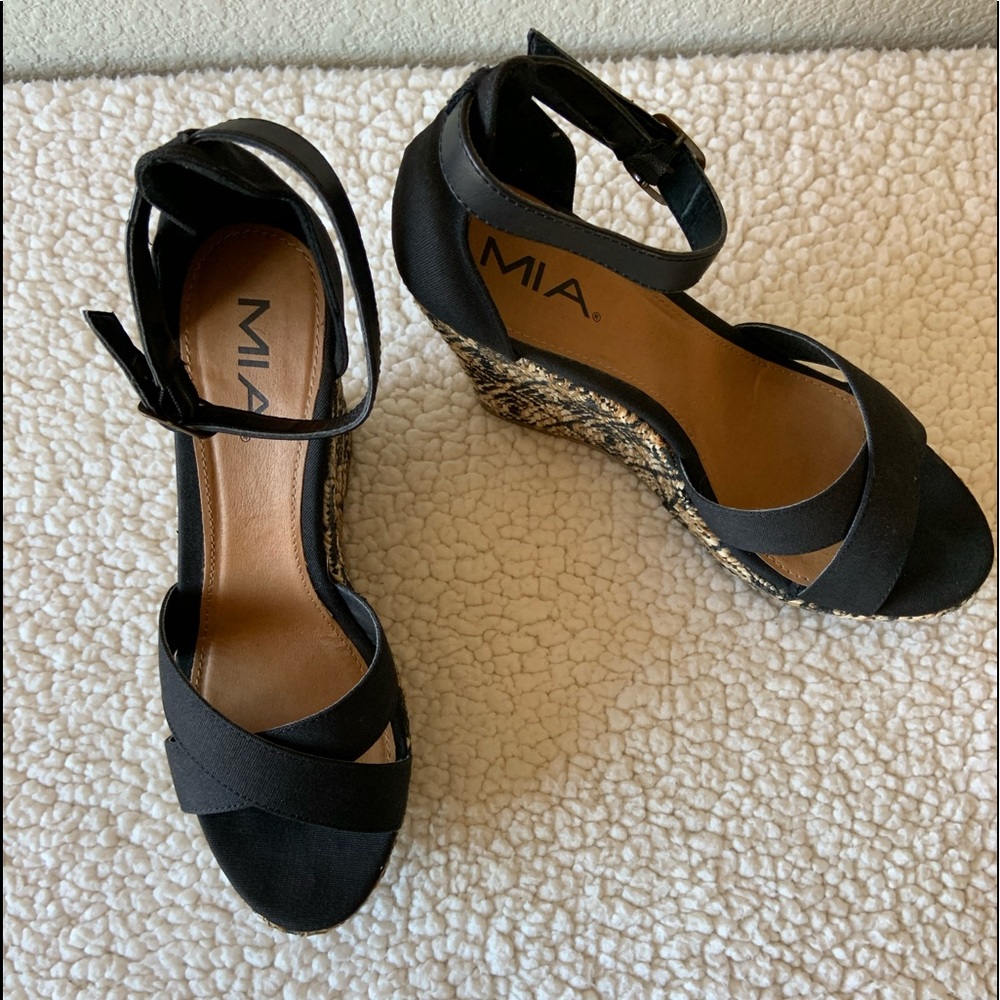 Black and Tan wedge sandal.